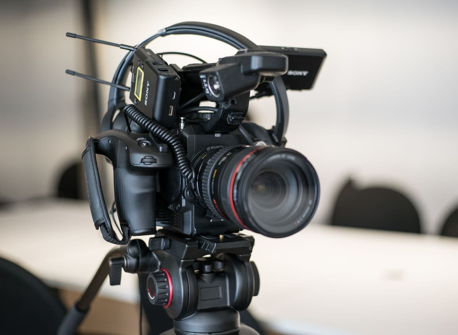 A camera and monitor set up to capture a full talk for later review